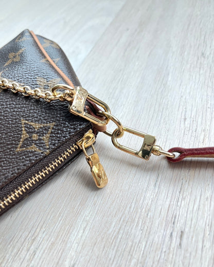 LOUIS VUITTON Monogram Pochette Eva Handbag | KOMMONS